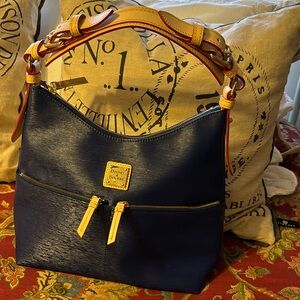 Navy blue hobo bag. Really cute new without tags .